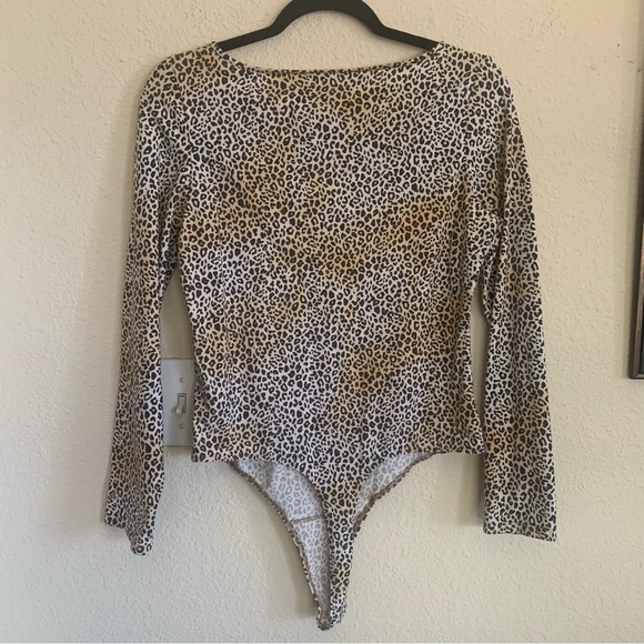 Pink Victoria’s Secret Animal Print Long Sleeve Thong Bodysuit - Picture 2 of 11